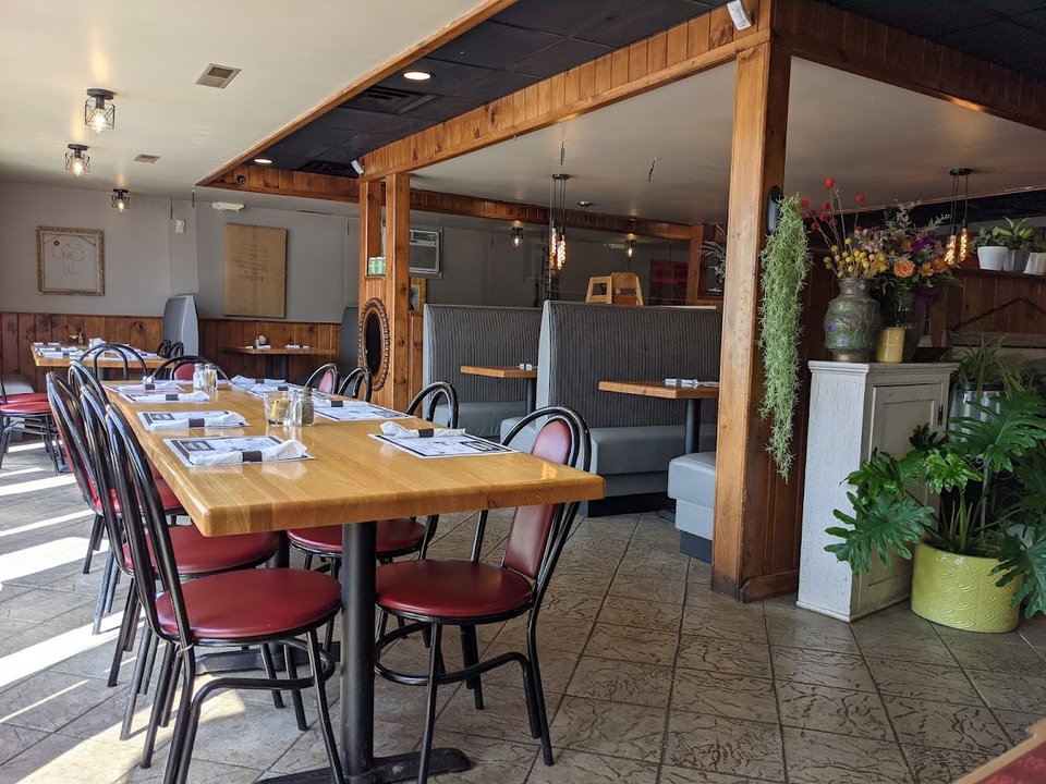 Diner storefront with parking nearby